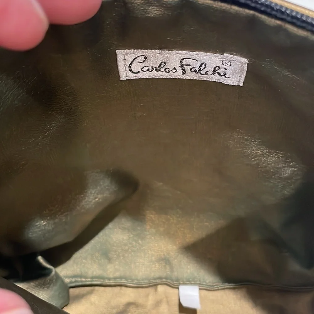 Carlos Falchi Zippered pouch in black with gold detail. New.